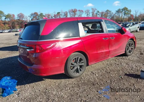 2022 Honda Odyssey Touring z USA, uszkodzony, nr VIN 5FNRL6H85NB067343